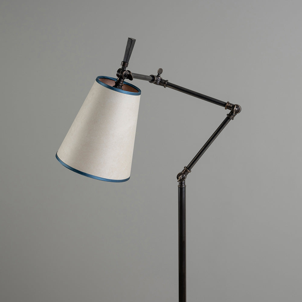 Focused Floor Lamp in Waxed Brass, With The Point Paper Empire Lamp Shade in Soft White with Peacock Blue Trim, and With Adjustable Levers - Nicola Harding