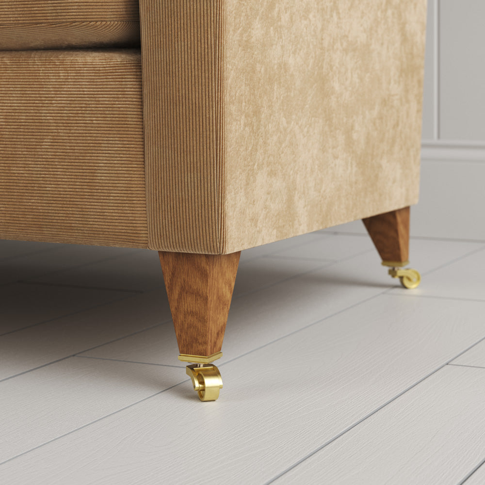 Idler sofa close-up detail of tapered timber legs with castors by NiX.