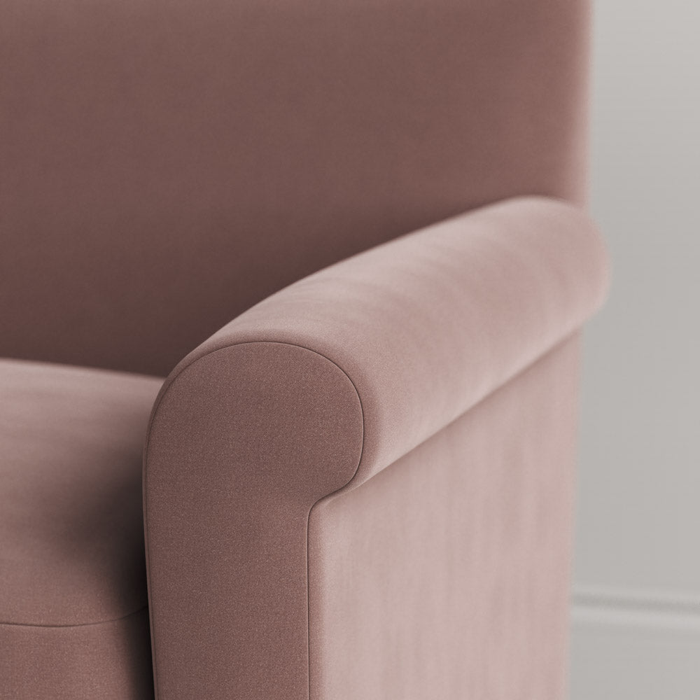 Close-up of Velvet Dusky Pink love seat armrest by Nicola Harding