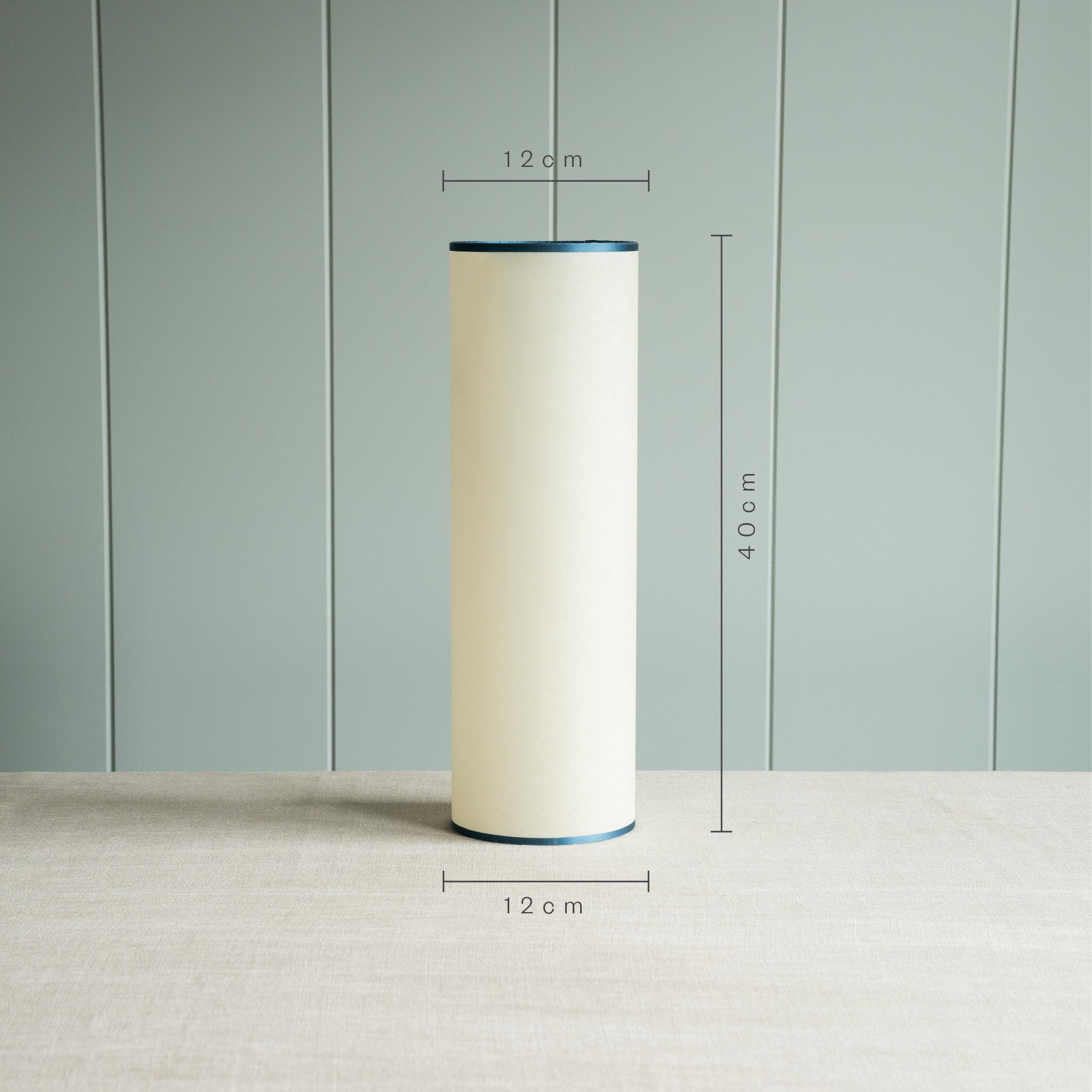 Dimensions of Pipe Up Cylinder Lamp Shade in Soft White with Blue Trim: Height 40cm, Top Width 12cm, Bottom Width 12cm – By NiX