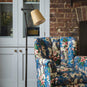 To The Point Batik Paper Empire Lamp Shade in Spotty Dotty Tan, With Floor Brass Waxed Lamp Near to Beautiful High Back Armchair - By NiX