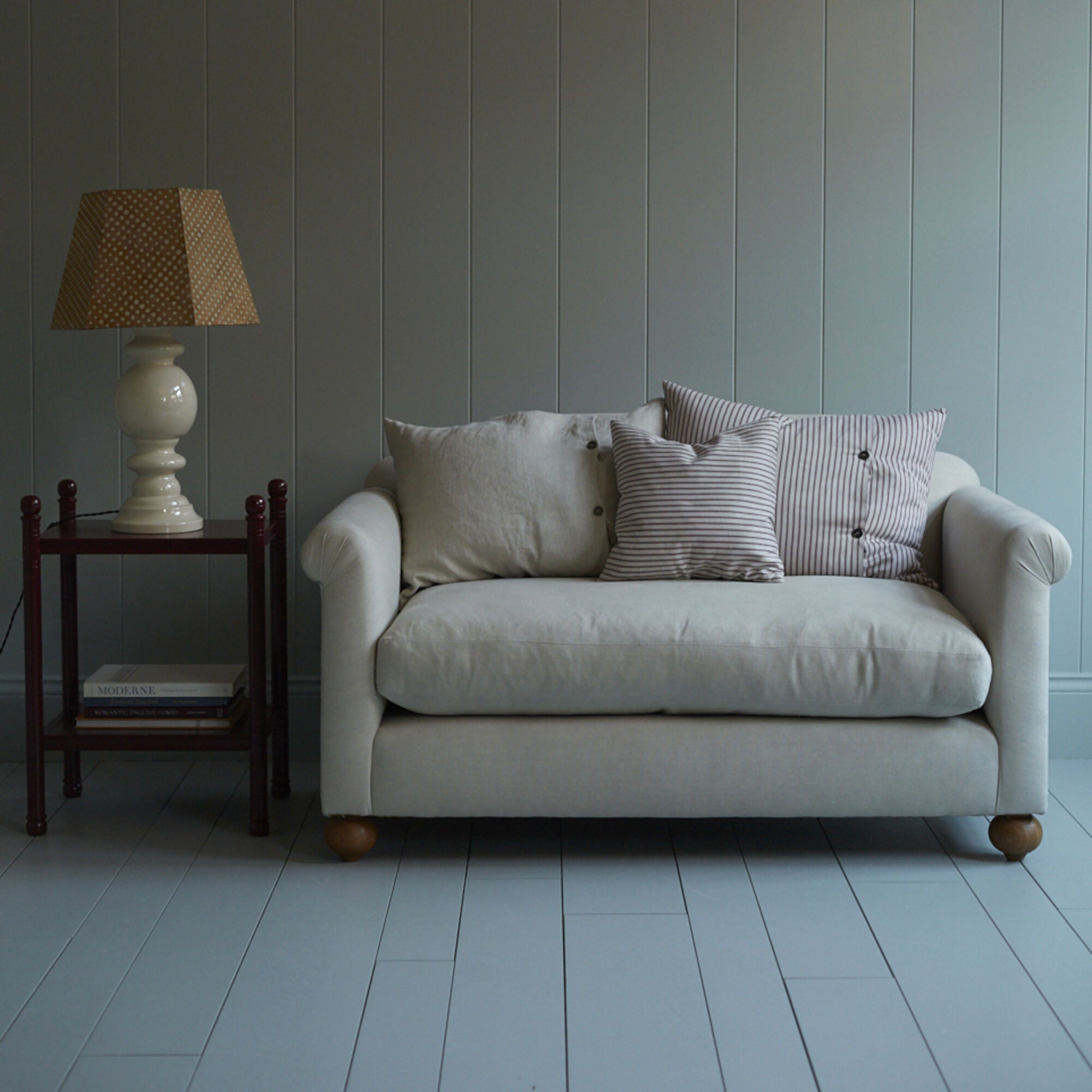 Dolittle Big Love Seat styled with NiX special cushions, lifestyle use in a room setting by Nicola Harding.