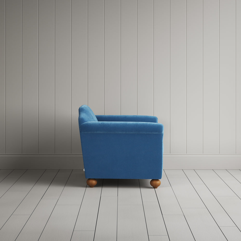 Side profile of the Harbour Blue corduroy Dolittle love seat