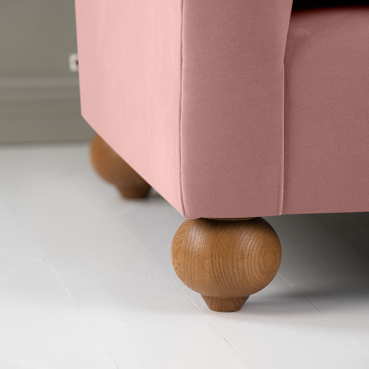 Dolittle Love Seat in Intelligent Velvet Rose, With Round Wooden Foot Closeup - Nicola Harding