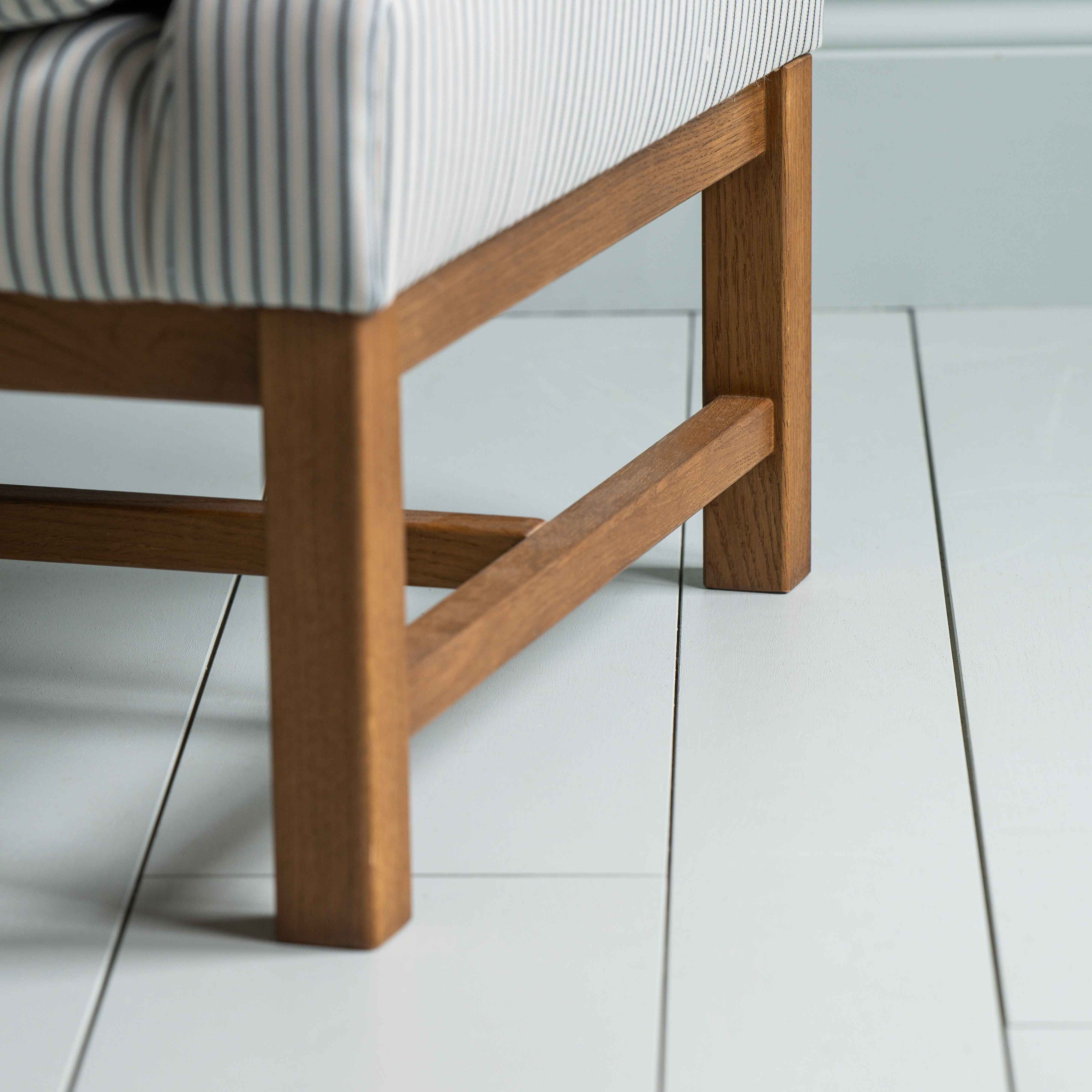 Upholstered Dining Bench in Ticking Cotton Aqua Brown, Frame Closeup - Nicola Harding & Co.