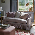 Curtain Call Sofa in Ticking Cotton, Berry, With NiX Cushions, Ottoman, Floor Lamp and a Side Table With Blue Base Lamp - NiX