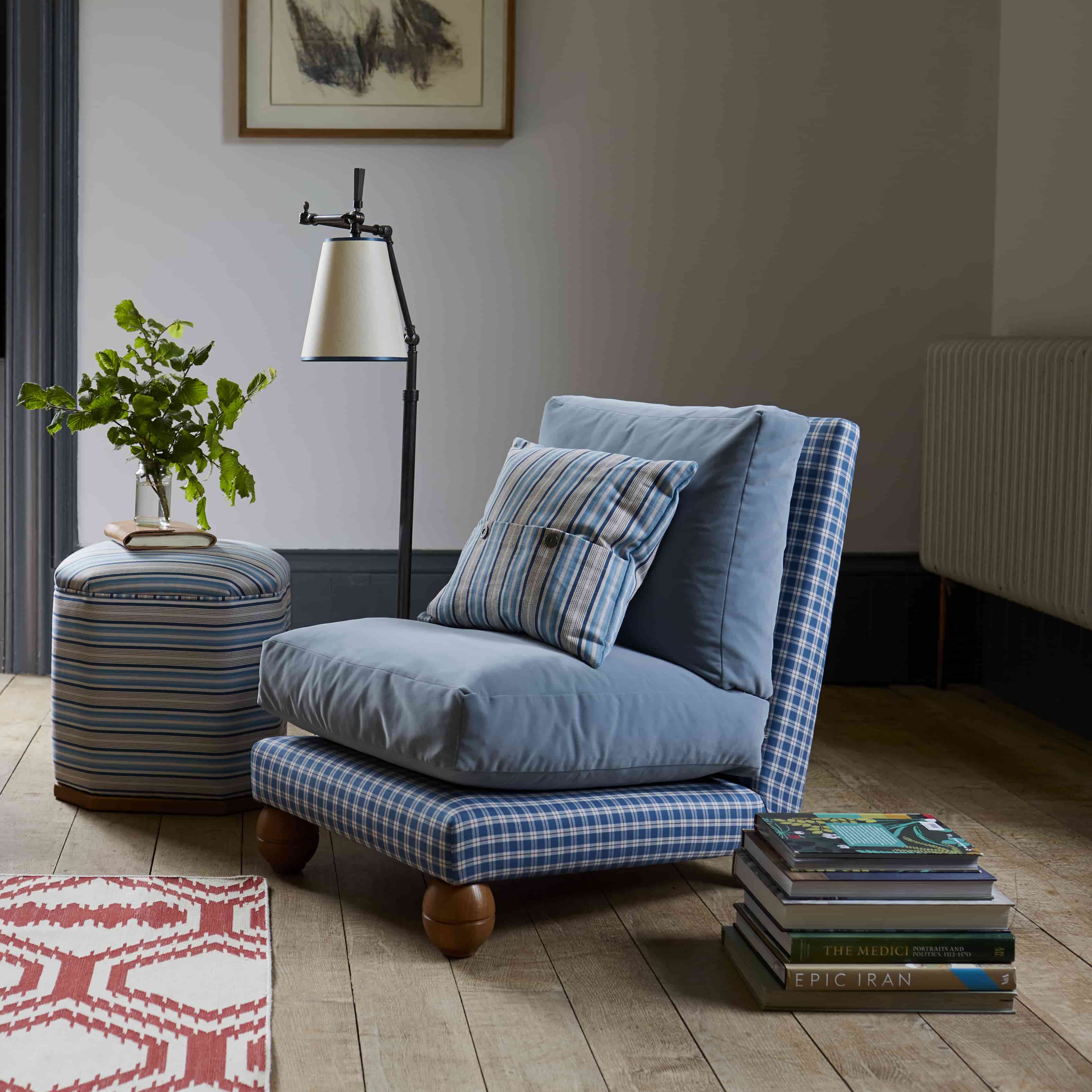 Perch Slipper Armchair in Well Plaid Frame and Intelligent Velvet Mineral Seat, With Cushion, an Ottoman, and a Brass Base Floor Lamp With, To The Point Paper Empire Lamp Shade in Soft White with Peacock Blue Trim - Nicola Harding