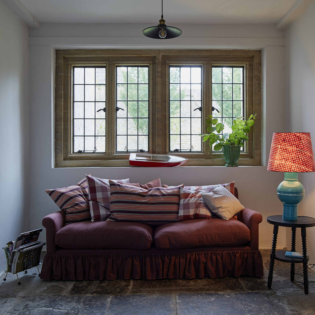 Curtain Call 4 Seater Sofa With NiX Square & Rectangle Cushions, and a Side Table With a Blue Base Lamp - NiX