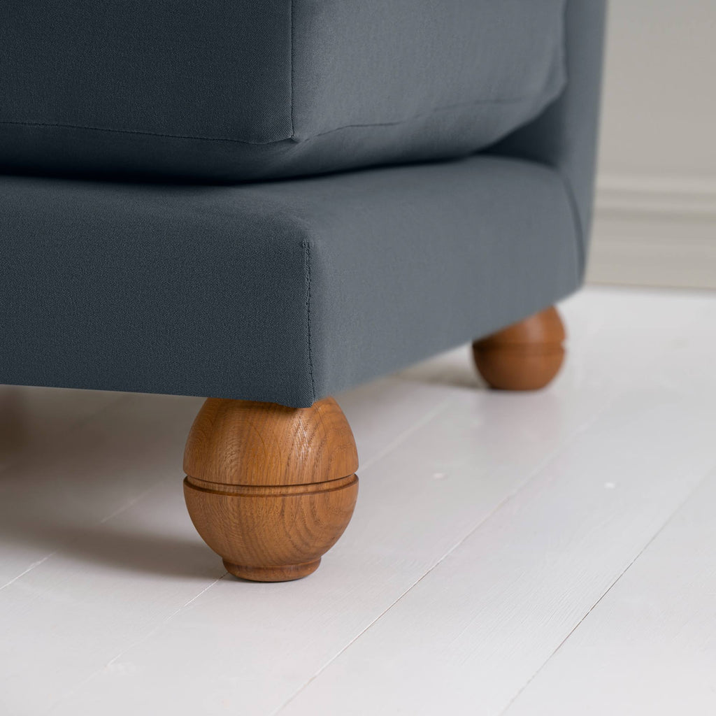 Perch Slipper Armchair in Well Plaid Frame and Intelligent Velvet Mineral Seat, With Cushion, an Ottoman, and a  Brass Base Floor Lamp With, To The Point Paper Empire Lamp Shade in Soft White with Peacock Blue Trim - Nicola Harding