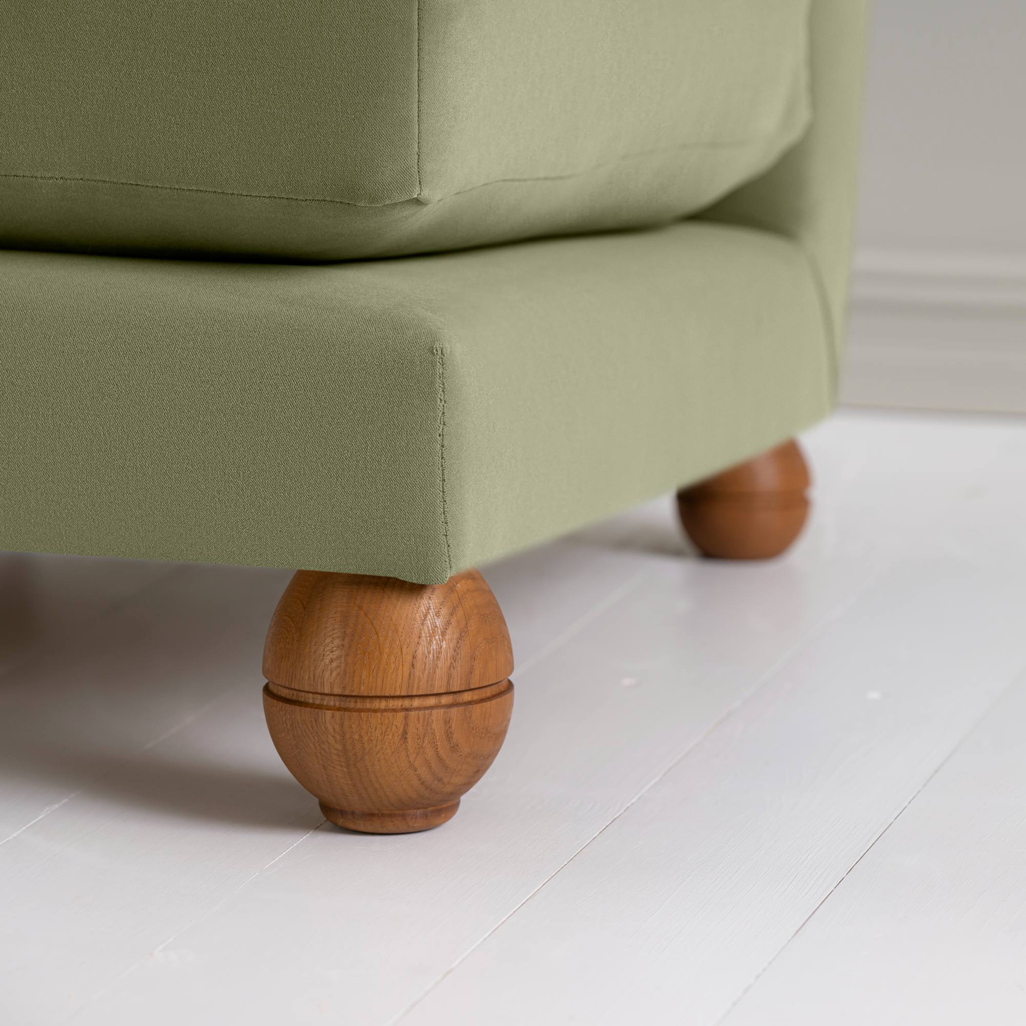 Perch Slipper Armchair in Intelligent Velvet Green Tea Front Round Wooden Foot Closeup - NiX