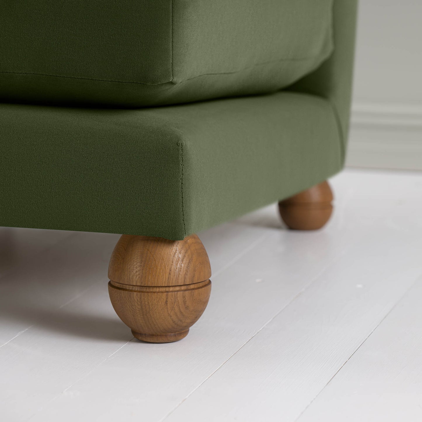 Perch Slipper Armchair in Intelligent Velvet Juniper, Front Round Wooden Foot Closeup - NiX