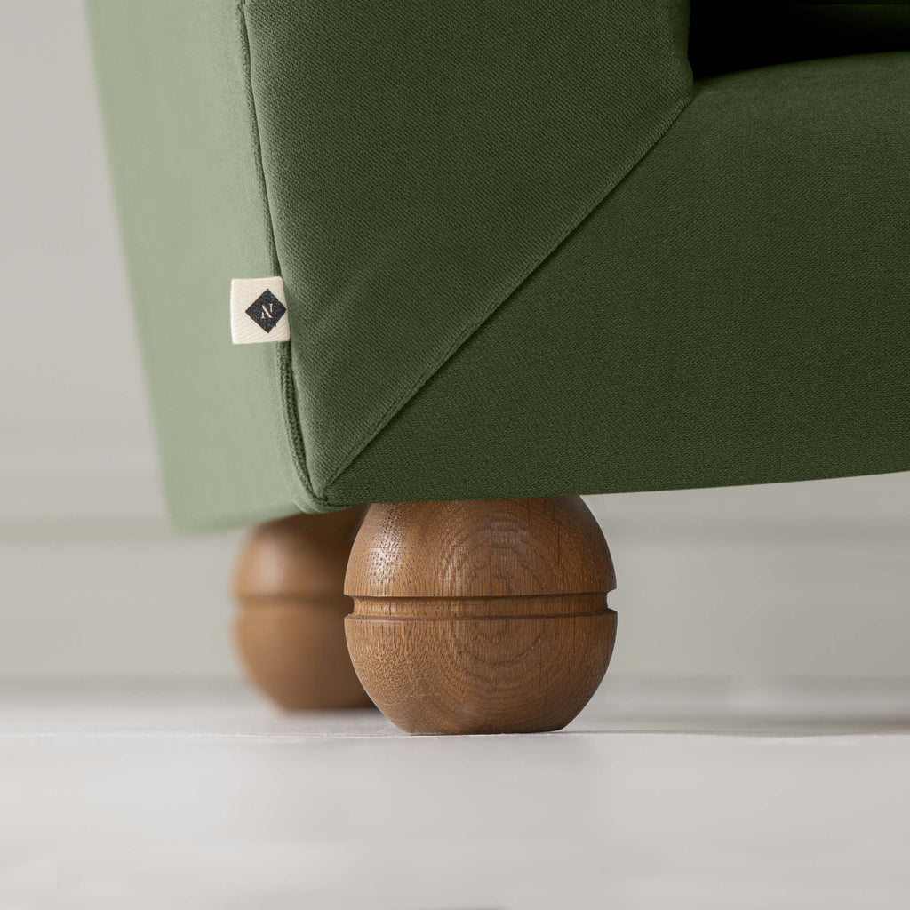 Perch Slipper Armchair in Intelligent Velvet Juniper, Back Side Round Wooden Foot Closeup With NiX Special Tag