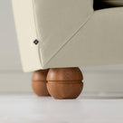 Perch Slipper Armchair in Intelligent Velvet Moonstone. Back Side Wooden Foot Closeup With NiX Special tag.