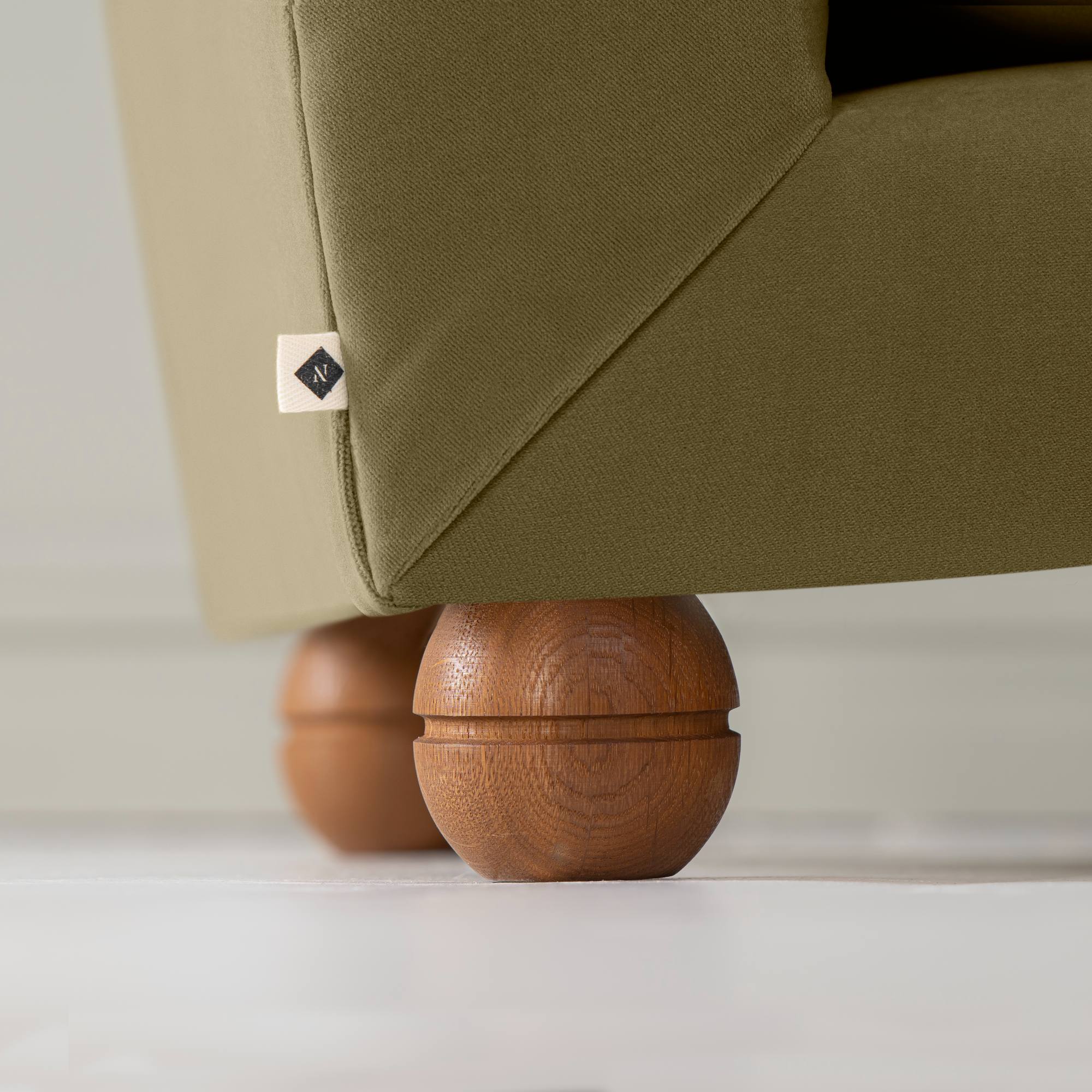 Perch Slipper Armchair in Intelligent Velvet Sepia, Back Round Wooden Foot With Special NiX tag