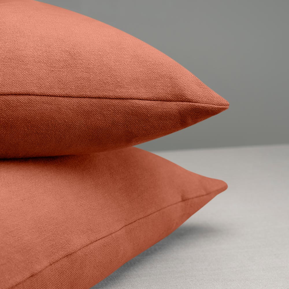 2 Square Kip Cushion in Laidback Linen, Cayenne on top of each other - Nicola Harding & Co.
