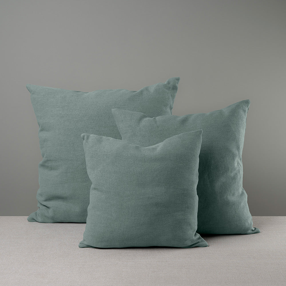 Different sizes of Square Kip Cushion in Laidback Linen, Mineral