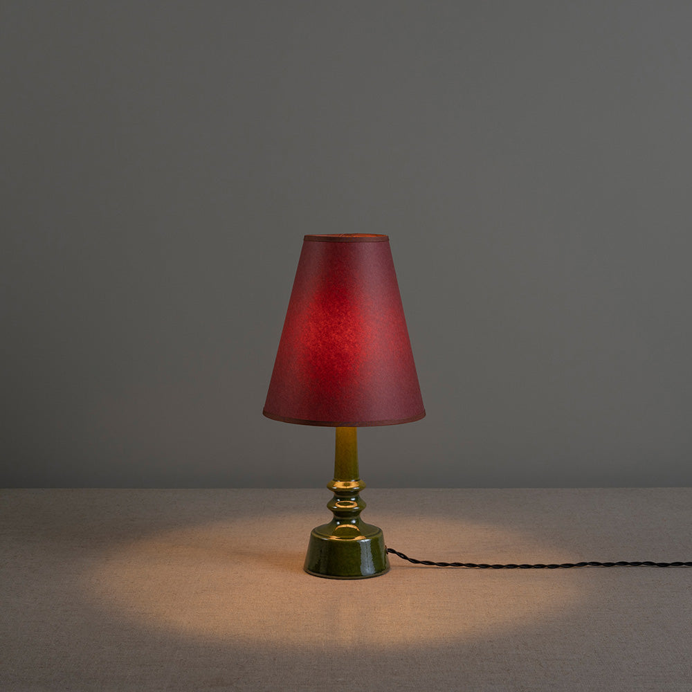 Ditsy Ceramic Table Lamp Base in Olive Green, With Focused Empire Paper Lamp Shade in Burgundy with Muted Pink Trim With Lights 'ON' - Nicola Harding