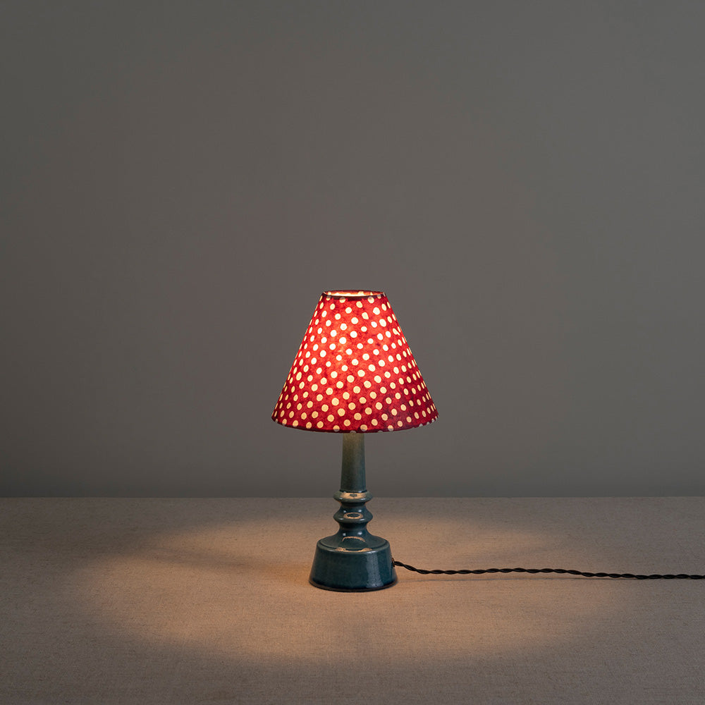 Ditsy Ceramic Table Lamp Base in Sea Blue, With Red Dotted Lampshade With Lights 'ON' - Nicola Harding