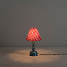 Ditsy Ceramic Table Lamp Base in Sea Blue, With Red Dotted Lampshade With Lights 'ON' - Nicola Harding