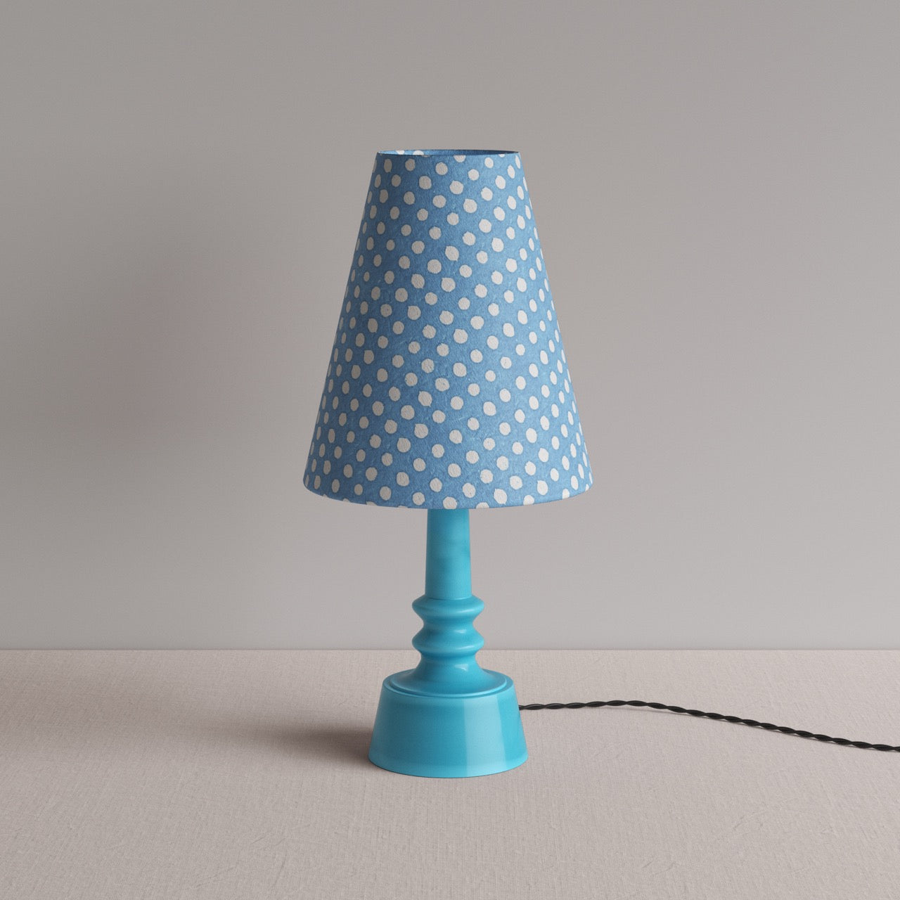 Ditsy Ceramic Table Lamp Base in Turquoise, With Ditsy Tall Tapered Lamp Shade in Dotty Sky Blue - Nicola Harding