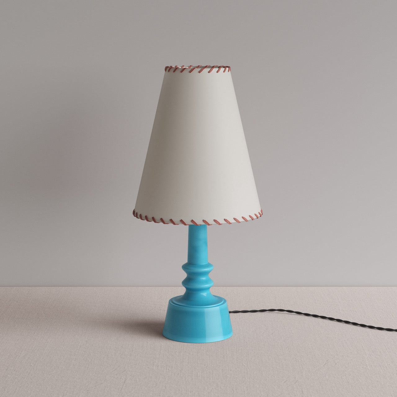 Ditsy Ceramic Table Lamp Base in Turquoise, With Ditsy Tall Tapered Lamp Shade in Natural Parchment - Nicola Harding