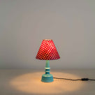 Ditsy Ceramic Table Lamp Base in Turquoise, With Ditsy Classic Empire Lamp Shade in Dotty Maroon, With Lights 'ON' - Nicola Harding