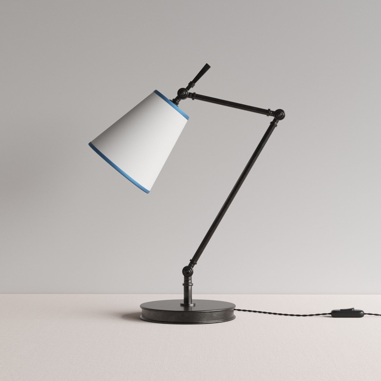 Focused Table Lamp Base in Waxed Brass, With Paper Empire Lamp Shade in Soft White with Peacock Blue Trim - By NiX