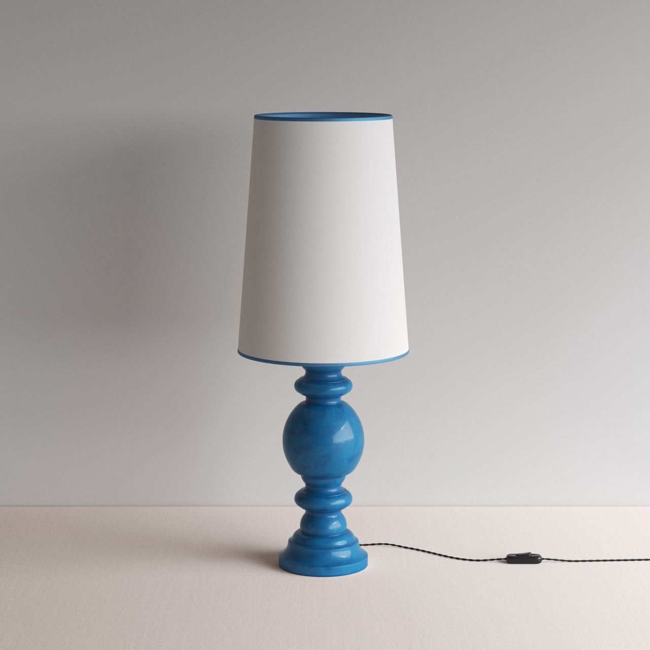 Hourglass Ceramic Table Lamp Base in Blue, With Whimsical Tall Straight Empire Lamp Shade in Soft White with Peacock Blue Trim - Nicola Harding
