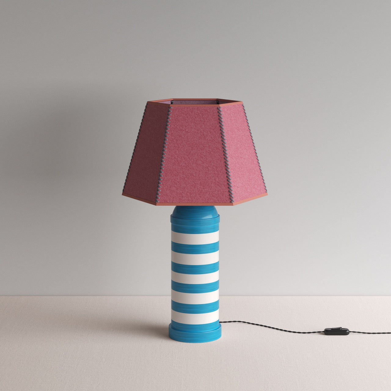 Humbug Striped Ceramic Table Lamp Base in Blue & Warm White, With Townhouse Hexagonal Lamp Shade in Burgundy with Pink Trim & Stitching - By NiX