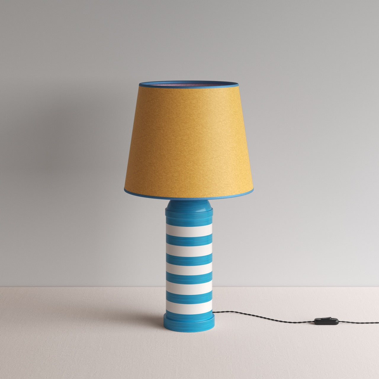 Humbug Striped Ceramic Table Lamp Base in Blue & Warm White, With Humbug Straight Empire Paper Lamp Shade in Mustard with Blue Trim - By NiX