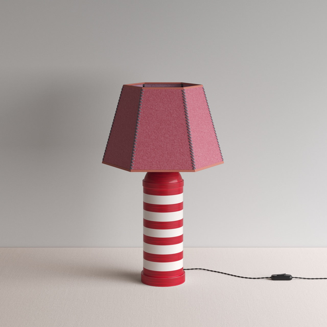 Humbug Striped Ceramic Table Lamp Base in Cherry Red & Warm White, With Townhouse Hexagonal Lamp Shade in Burgundy with Pink Trim & Stitching - By NiX
