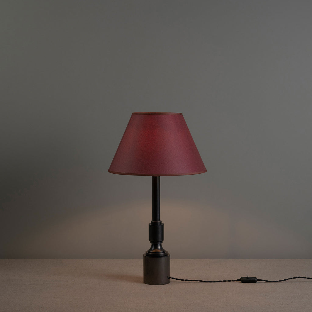 Waxed solid brass lamp base with pink lampshade lights 'ON'- By NiX