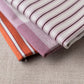 Luster Tea Towel in Checkmate Cotton, Berry