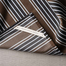 Luster Tea Towel in Regatta Cotton, Charcoal - Nicola Harding