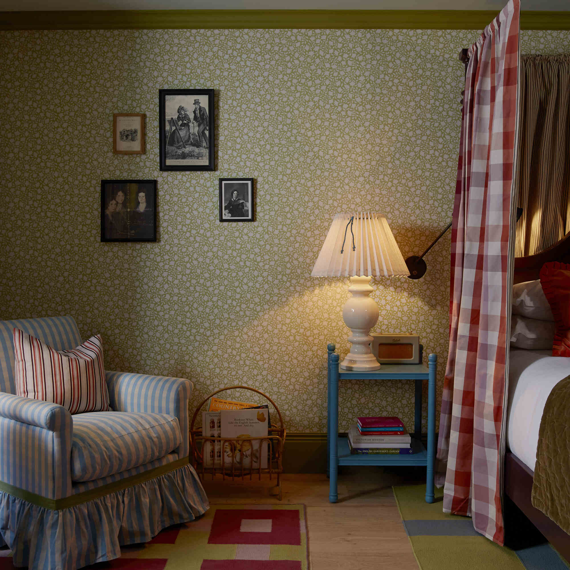 Bedroom decorated with Ginkgo wallpaper in Moss Green, designed by Nicola Harding & Co.