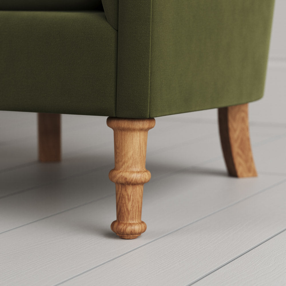 Time Out Armchair close-up detail of the turned timber front legs by NiX.
