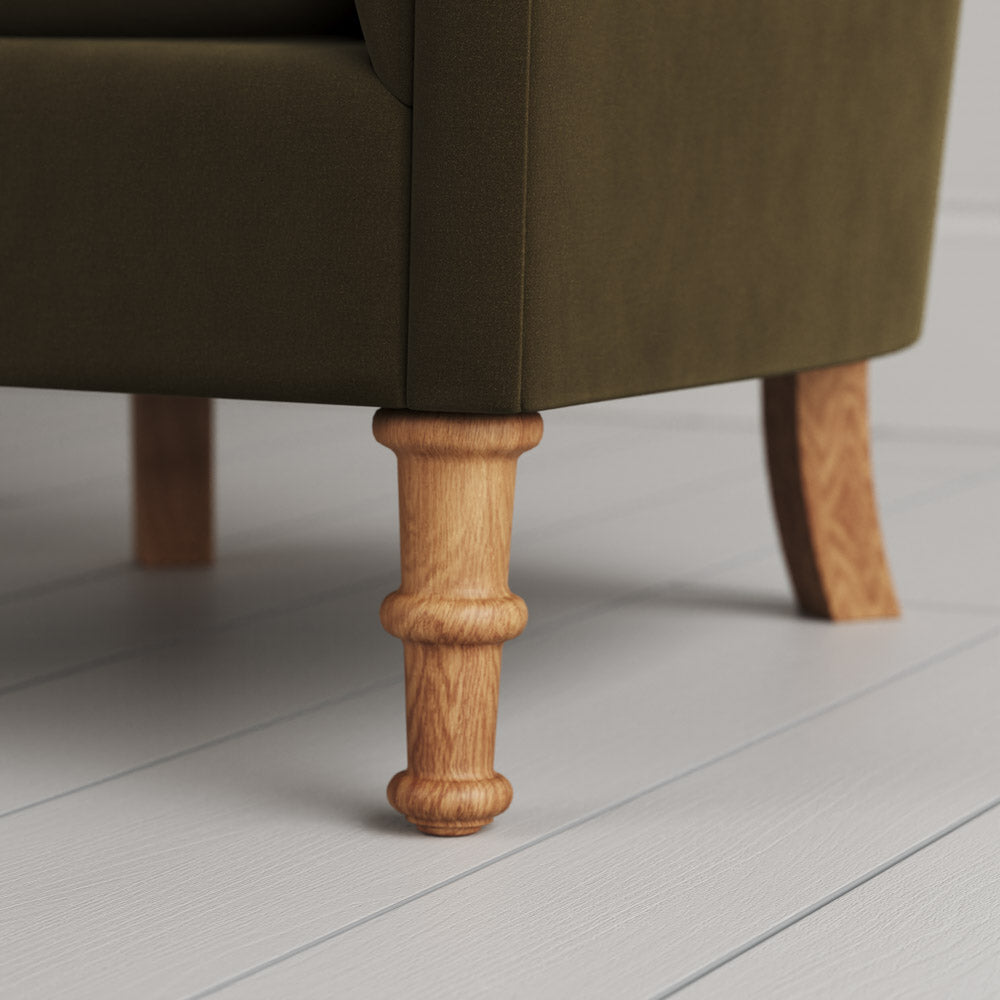 Time Out Armchair close-up detail of the turned timber front legs by NiX.