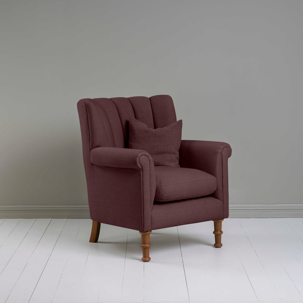Time Out Armchair in Laidback Linen Damson, Side View With Matching Cushion on it - NiX