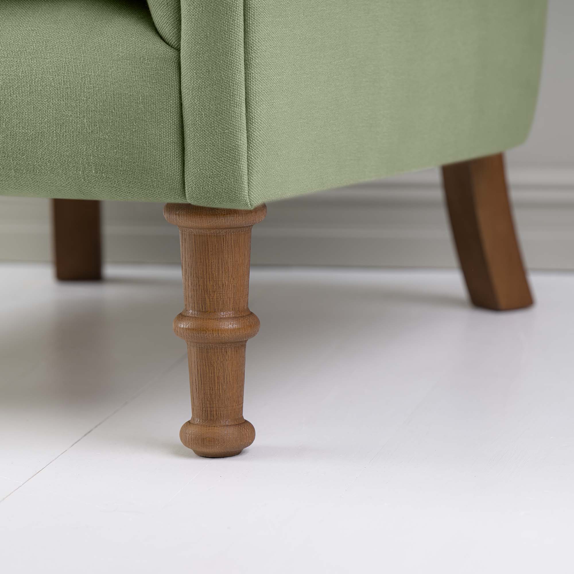 Time Out Armchair in Laidback Linen Moss, Front Foot Design Closeup - NiX
