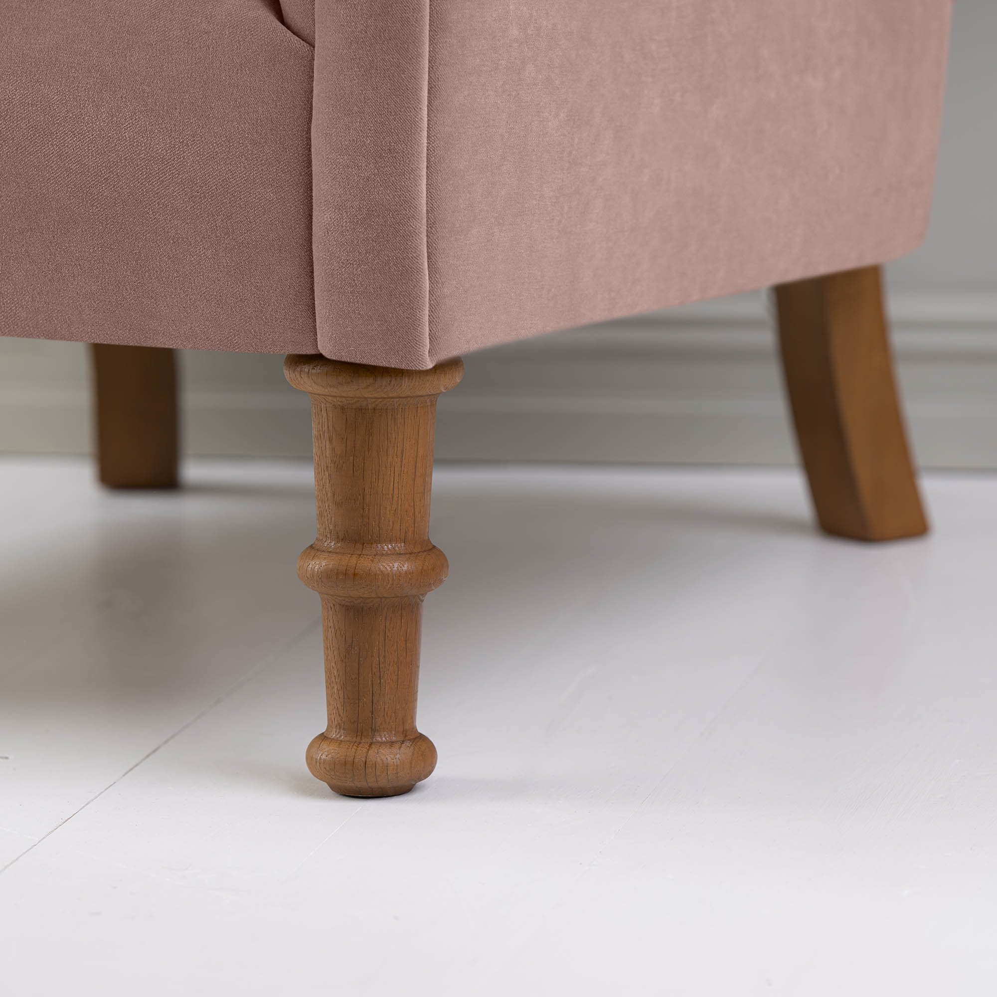 Time Out Armchair in Intelligent Velvet Dusky Pink, Front Wooden Foot Closeup - NiX