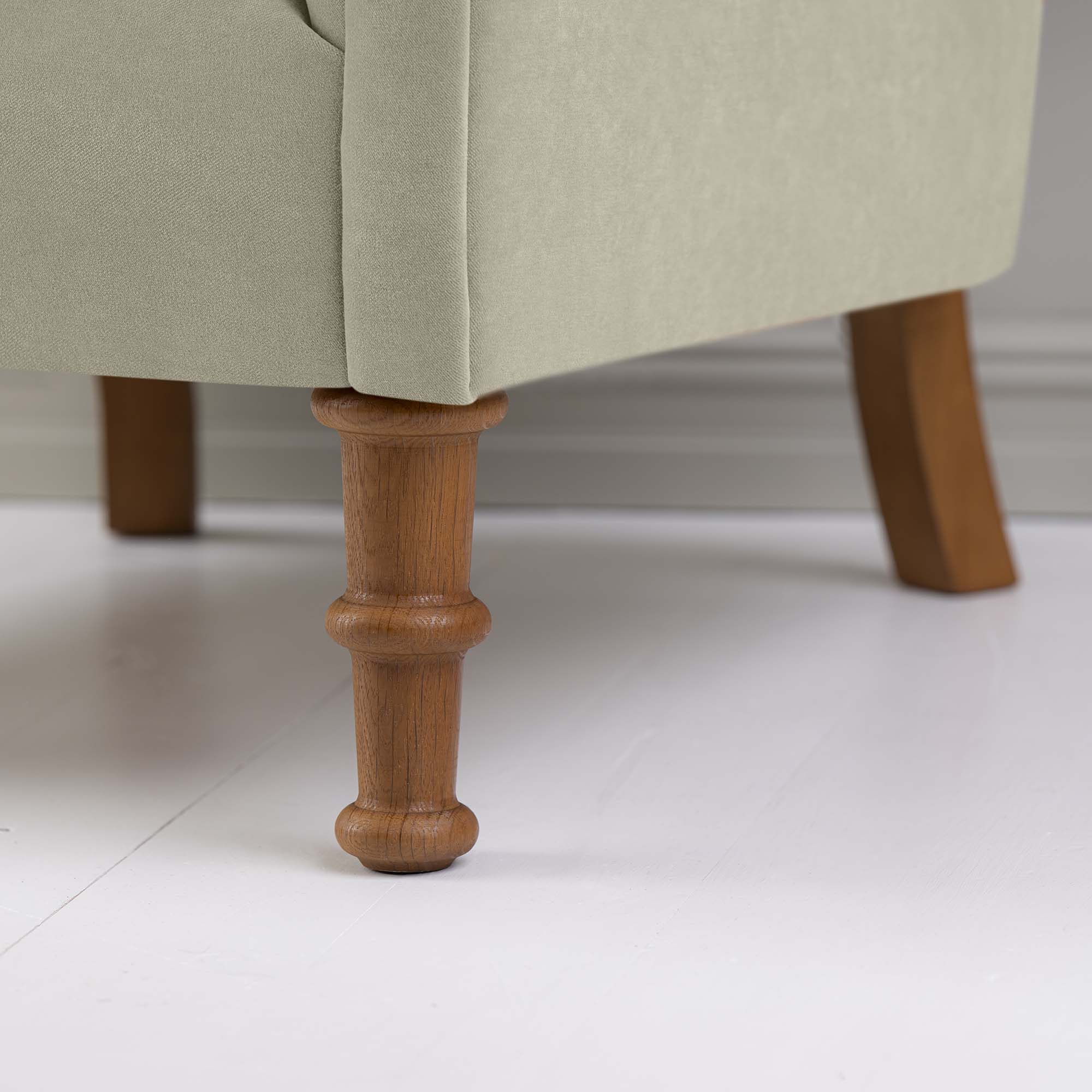 Time Out Armchair in Intelligent Velvet Moonstone, Front Foot Design Closeup - NiX