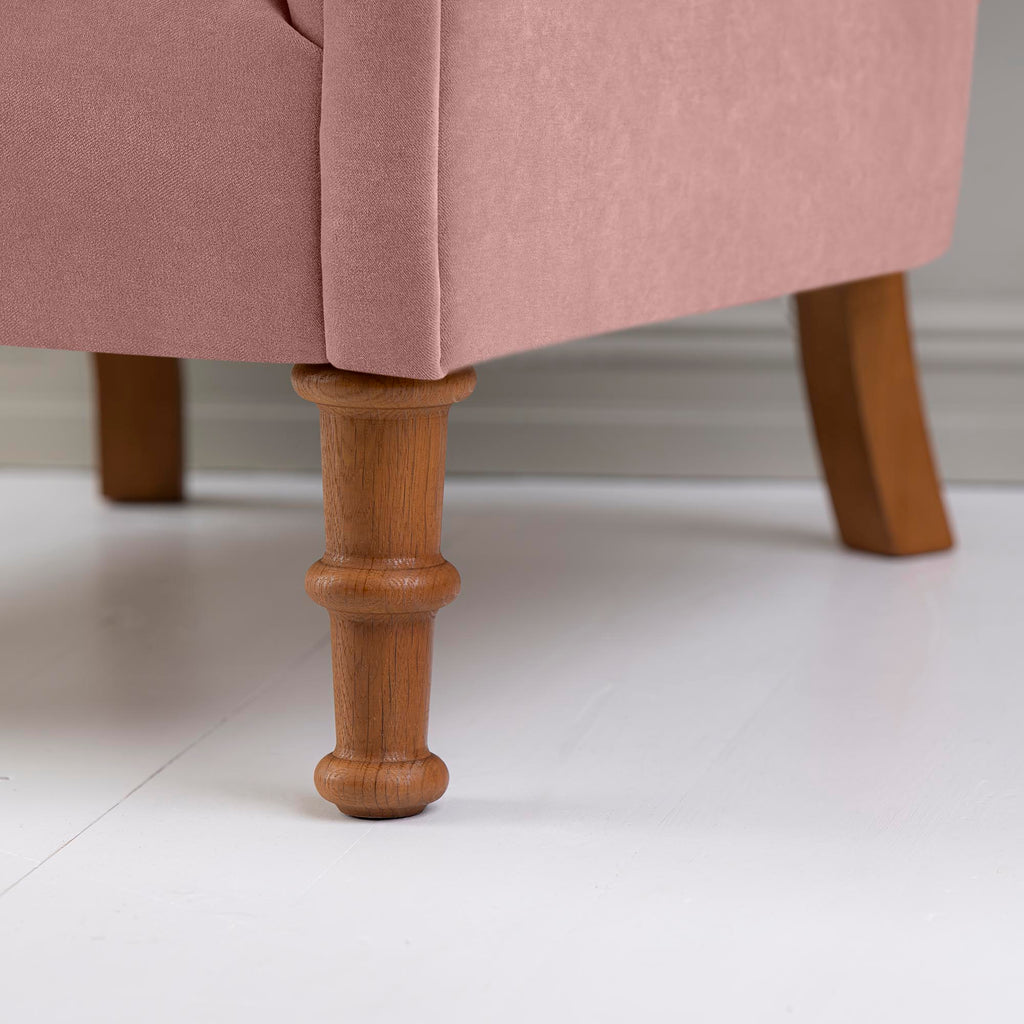 Time Out Armchair in Intelligent Velvet Rose, Front Wooden Foot Design Closeup - NiX