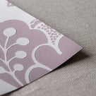 Close-up of the fine, neat edge of Albion Wallpaper in Mauve, designed by Nicola Harding.