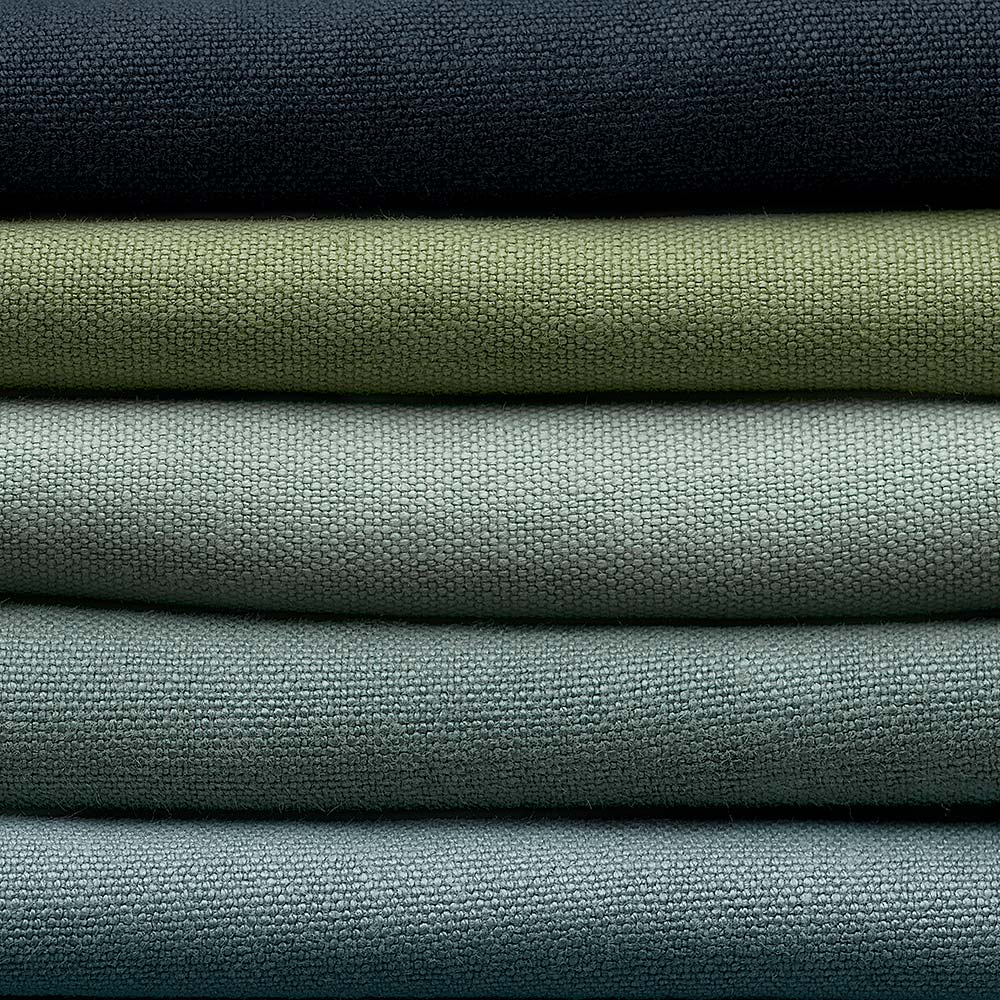 Stack of Linen Fabrics in Multiple Colors Layered Together – By NiX