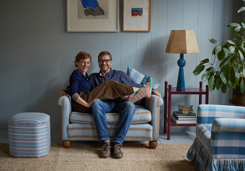 Nicola Harding and Andy sitting on loveseat