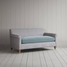 Angled profile of 2 seater idler sofa in ticking blue brown frame by NiX