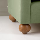  Dolittle 2 Seater Sofa in Laidback Linen Moss, Round Wooden Foot Closeup - Nicola Harding 