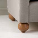  Dolittle 2 Seater Sofa in Laidback Linen Pearl Grey, Round Wooden Foot Closeup - Nicola Harding 