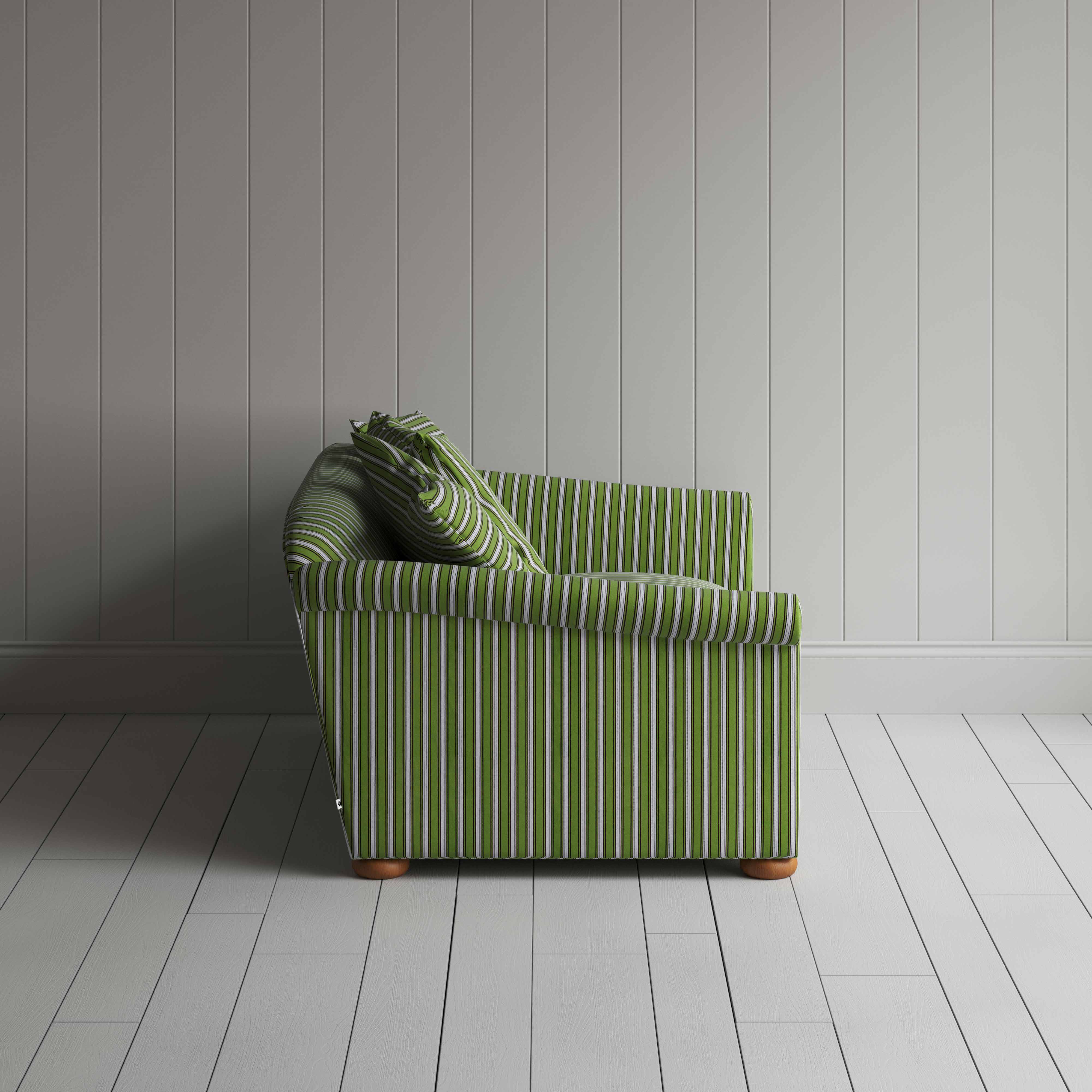  Striped green and white sofa in front of wall. 