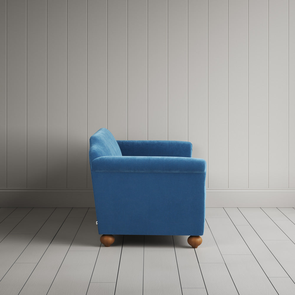  Side profile of the Harbour Blue corduroy Dolittle sofa 